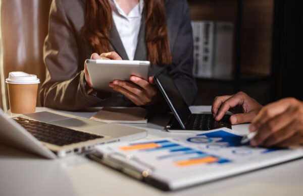 Business People Talking Discussing with financial document data
