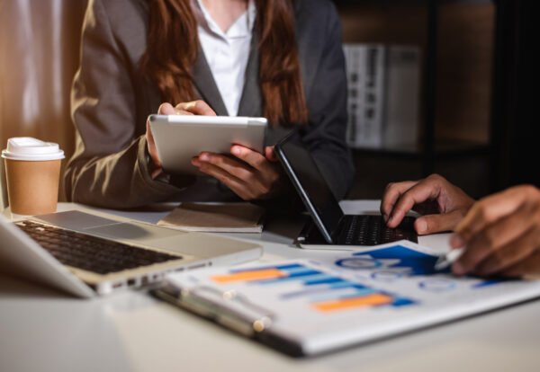 Business People Talking Discussing with financial document data
